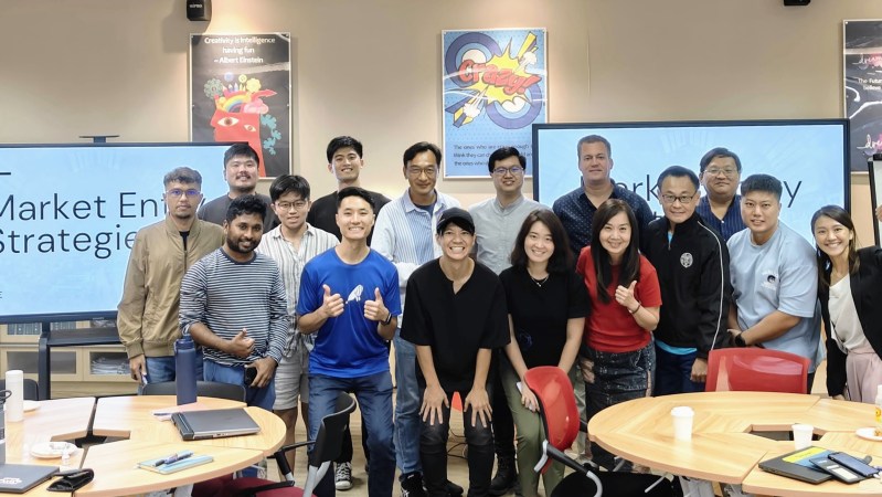 GoodWhale-led session at ITE showcasing Business Model Canvas and interactive startup exercises.